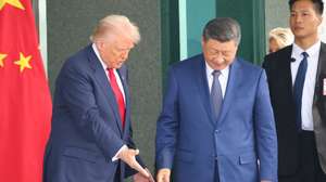 epa12492357 US President Donald Trump (L) gestures to Chinese President Xi Jinping (C) after their meeting at the Naraemaru reception hall inside an Air Force base in Busan, South Korea, 30 October 2025.  EPA/YONHAP SOUTH KOREA OUT