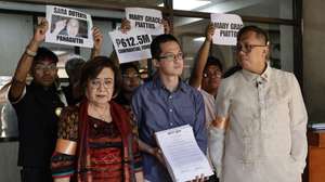 epa12699534 Philippines legislators Leila de Lima (front, L) and Perci Cendana (front, R) join members of opposition organizations after filing an impeachment complaint against Vice-President Sara Duterte (not pictured) at the House of Representatives (HOR) in Quezon City, Metro Manila, Philippines, 02 February 2026. Two impeachment complaints against Duterte were filed at the HOR on 02 February, as the HOR Justice Committee on the same day deliberates on impeachment complaints filed against Philippine President Ferdinand Marcos Jr.  EPA/ROLEX DELA PENA
