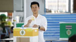epa12714921 Leader of the People's Party and prime ministerial candidate Natthaphong Ruengpanyawut casts a ballot for the national referendum during the general election at a polling station in Bangkok, Thailand, 08 February 2026. According to the Election Commission of Thailand (ECT), 52.9 million Thais are registered to vote in the 08 February general election to elect members of the House of Representatives, and participate in a national referendum on constitutional amendments.  EPA/RUNGROJ YONGRIT
