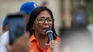 epa12901518 Venezuela’s acting president, Delcy Rodriguez, speaks outside the Basilica of Our Lady of the Rosary of Chiquinquira in Maracaibo, Venezuela, 19 April 2026. Rodriguez promised a new era of hope for the country just over 100 days after taking office, following Nicolas Maduro’s capture by the United States last January in Caracas.  EPA/Henry Chirinos