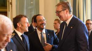 epa13017863 French President Emmanuel Macron (L), President of Cyprus Nikos Christodoulides (C) and Serbian President Aleksandar Vucic (R) talk ahead of the plenary session at the EU-Western Balkans summit in Tivat, Montenegro, 05 June 2026. The high-level one-day summit brings together European Union (EU) leaders and their Western Balkan counterparts to discuss concrete integration measures and accelerate the region's path toward bloc membership.  EPA/BORIS PEJOVIC