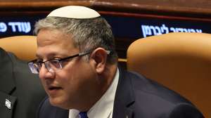 epa12579817 Picture taken on December 08 shows Israeli Minister of National Security Itamar Ben-Gvir wears a pin on his lapel of a noose as part of his campaign for a 'death penalty for terrorists' law as he attends the plenary of the Knesset, the Israeli Parliament, during a debate on the 40 signatures initiated by the opposition regarding Israel's international status in Jerusalem, 08 December 2025.  EPA/ABIR SULTAN