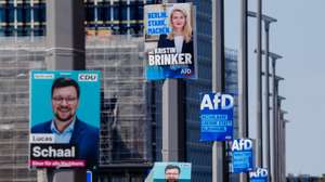 epa13148598 Campaign posters of Alternative for Germany (AfD) party and Christian Democratic Union (CDU) hang on lamp poles in Berlin, Germany, 03 August 2026. Regional state elections for the Berlin House of Representatives are scheduled for 20 September 2026.  EPA/CLEMENS BILAN