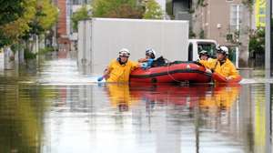 epaselect epa13255324 Firefighters work on a flooded road following heavy rain brought by Typhoon Dujuan in Sakura, Chiba Prefecture, Japan, 22 September 2026. According to Chiba and Kanagawa prefectures, heavy rain brought by Typhoon Dujuan triggered landslides in Chiba and Kanagawa prefectures, leaving six people dead and six others missing.  EPA/JIJI PRESS JAPAN OUT EDITORIAL USE ONLY/