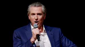 epa12770672 Democratic California Governor Gavin Newsom during his 'Young Man in a Hurry: A Memoir of Discovery' book tour stop in Atlanta, Georgia, USA, 22 February 2026. The autobiographical book will be released 24 February 2026.  EPA/ERIK S. LESSER
