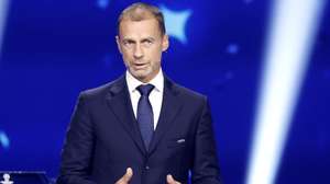 epa13194825 UEFA president Aleksander Ceferin addresses the audience at the start of the 2026/27 UEFA Champions League league phase draw at the Grimaldi Forum in Monaco, 27 August 2026.  EPA/SEBASTIEN NOGIER
