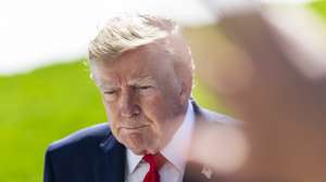 epa13300711 US President Donald Trump speaks to reporters as he departs the White House for Alaska, in Washington, DC, USA, 13 October 2026. President Trump is traveling to Alaska to campaign for incumbent Republican Senator Dan S. Sullivan, who is running for re-election in November 2026.  EPA/JIM LO SCALZO