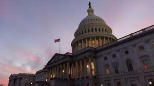 epa11083859 The US Capitol Building is seen at dusk before a Senate vote on Capitol Hill in Washington, DC, USA, 16 January 2024. The Senate is poised to vote whether to to advance a short-term government funding bill to fund the government into March and avert a partial shutdown of the federal government before a deadline at the end of this week.  EPA/MICHAEL REYNOLDS