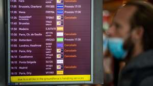 A man looks to a monitor with incoming flights to Lisbon, many of them canceled due to a strike of the handling company, Groundforce, which is causing major disruption in the Lisbon Airport, causing the cancelation of dozens of flights, in Lisbon, Portugal, 17 July 2021. Groundforce workers are protesting against colective dismissal of workers and low salaries. JOSE SENA GOULAO/LUSA