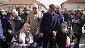 epa11282327 French President Emmanuel Macron meets Alphonse Taravello (L), 98, a resistance fighter, and Yvonne Cheval , 99, who lost part of her family during WWII, in Vassieux-en-Vercors, central France, 16 April 2024. The French president is in the region to pay homage to the local Resistance during WWII as part of the 80th anniversary of the liberation of Nazi occupied France.  EPA/Laurent Cipriani / POOL  MAXPPP OUT