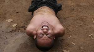 epaselect epa12258292 A new cadet member of the People's Defence Force (PDF) practices the military exercise during the basic military training at a secret jungle camp in Mon State, Myanmar, 12 July 2025 (issued 24 July 2025). The new cadets are being trained by senior members of the People's Defence Force (PDF) who have previously completed the Special Operations Forces program. The basic military training includes physical conditioning, weapons handling, basic combat medical care, and political and ethical education aimed at shaping them into disciplined and principled soldiers. Members of the PDF have been resisting Myanmar’s military junta since the coup on 1 February 2021.  EPA/KAUNG ZAW HEIN