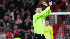 Referee Francois Letexier makes the racism sign after Real Madrid's Vinicius Junior dennounced Benfica´s player Gianluca Prestianni during the UEFA Champions League soccer match between Benfica and Real Madrid, in Lisbon, Portugal, 17 February 2026.  JOSE SENA GOULAO/LUSA