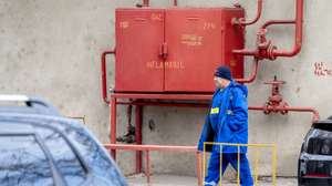 epa11809448 A Chisinaugaz worker walks past a gas panel near the Moldovagaz building in Chisinau, Moldova, 06 January 2025. Russian energy giant Gazprom suspended natural gas supplies to Moldova as of 01 January 2025, citing unpaid debts. At the same time, Gazprom said it had stopped after Ukraine refused to renew a transit agreement. In the Russia-backed breakaway region of Transnistria, also supplied with Russian gas, energy company Tirasteploenergo urged residents to dress warmly, gather family members together in a single room, hang blankets or thick curtains over windows, and use electric heaters.  EPA/DUMITRU DORU