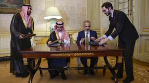 Portuguese Minister of State and Foreign Affairs, Paulo Rangel (C-R) flanked by his counterpart of Saudi Arabia, Faisal bin Farhan Al Saud (C-L) sign a memorandum of understanding after a meeting at Necessidades Palace, in Lisbon, Portugal, 16 June 2026. ANTONIO PEDRO SANTOS/LUSA