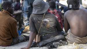 epa13171283 Sub-Saharan African and Sudanese migrants  gather in Fnideq as they attempt to enter Ceuta in Fnideq (Castillejos), Morocco, 15 August 2026. Moroccan security sources report that the incident took place in a mountainous area on the outskirts of Castillejos, southwest of Ceuta.  EPA/JALAL MORCHIDI