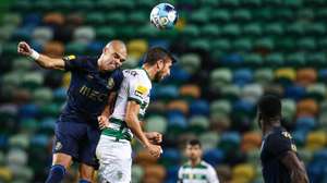 Sporting's Paulinho (R) in action against FC Porto's Pepe (L) during the Portuguese First League soccer match between Sporting and FC Porto at José de Alvalade Stadium in Lisbon, Portugal, 11 September 2021. RODRIGO ANTUNES/LUSA