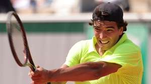 epa12147220 Henrique Rocha of Portugal in action during his Men's 3rd round match against Alexander Bublik of Kazakhstan at the French Open Grand Slam tennis tournament at Roland Garros in Paris, France, 31 May 2025.  EPA/TERESA SUAREZ