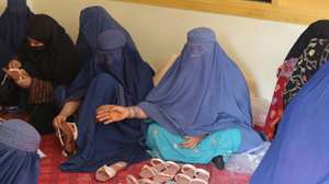epa12552363 Women make handmade sandals during a UN Women–supported shoe-making training in Jalalabad, Afghanistan, 27 November 2025. In Behsood district of Nangarhar, UN Women and AESHO trained 50 impoverished and returning women in shoe-making over five months, culminating in graduation certificates and tool kits to help them start stitching shoes and support their new livelihoods and future income.  EPA/Stringer