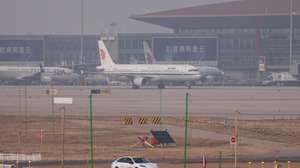 epa12850957 An Air China passenger airplane lands at Beijing Capital International Airport in Beijing, China, 26 March 2026.  EPA/WU HAO