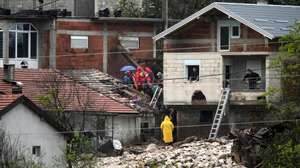 epa11643877 Relief and rescue workers assess the damage brought by the flash floods in the village of Donja Jablanica, Bosnia and Herzegovina, 05 October 2024. Central and southern parts of Bosnia and Herzegovina were hit by a severe rainstorm on 03 October 2024, which caused widespread flooding, closing roads, cutting electricity, and disrupting telecom signals. Rescue services in Jablanica and Kiseljak reported several people missing and called for army assistance, as access to Jablanica was completely blocked due to road and rail closures. 19 fatalities due to the flash floods have been confirmed so far by the regional government of Hercegovacko-Neretvanska county.  EPA/NIDAL SALJIC