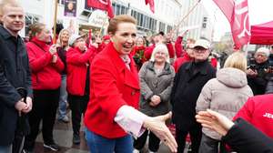epa12846009 Denmark's Prime Minister and Social Democrats leader Mette Frederiksen (C) greets people on election day on the street at Nytorv in Aalborg, Denmark, 24 March 2026.  EPA/Henning Bagger  DENMARK OUT