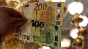 epa07596701 A view of new euro banknotes in Riga, Latvia, 24 May 2019. Latvia will be launching new 100 euro and 200 euro banknotes On 28th May 2019. These are the latest European series of banknotes with refurbished design and advanced security features.  EPA/Toms Kalnins