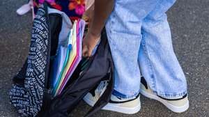 epa10839378 A schoolchild of the &#039;Bois de l&#039;Etang&#039; school prepares her bag for the start of the new school year in La Verriere, west of Paris, France, 04 September 2023. The elementary school of this Paris’ suburb was destroyed  during the riots sparked by the death of a young man killed by a police officer during a traffic stop in June 2023.  EPA/CHRISTOPHE PETIT TESSON