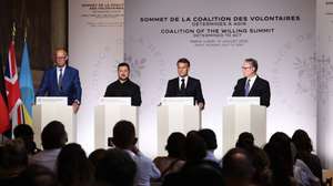 epa13109103 (L-R) German Chancellor Friedrich Merz, Ukrainian President Volodymyr Zelensky, French President Emmanuel Macron, and British Prime Minister Keir Starmer address a press conference after the Coalition of the Willing summit on security guarantees for Ukraine at the Hotel des Invalides in Paris, France, 13 July 2026.  EPA/TERESA SUAREZ / POOL