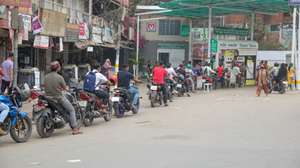epaselect epa12808771 People queue with their motorcycles at a fuel station in Dhaka, Bangladesh, 10 March 2026. Dhaka and other parts of the country have faced unusually long queues at petrol pumps in recent days; this comes after the recent conflict in the Middle East. According to the Bangladesh Petroleum Corporation (BPC), ride-sharing motorbikes will now be allowed to purchase up to 5 liters of fuel per day from filling stations, increased from the previous limit of 2 liters per day.  EPA/MONIRUL ALAM