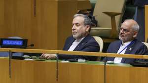 epa13257808 Minister of Foreign Affairs of Iran Abbas Araghchi (C) listens as President of Iran Masoud Pezeshkian speaks during the General Debate of the 81st session of the United Nations General Assembly at United Nations Headquarters in New York, New York, USA, 23 September 2026.  EPA/SARAH YENESEL