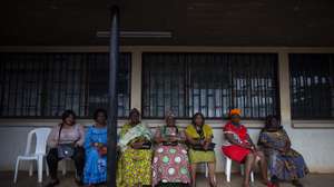 epa07077330 Cameroonian women wait to see the results after they cast their ballots at a polling station in the capital Yaounde, Cameroon, 07 October 2018. The incumbent President Paul Biya is Africa's oldest president who has been in power for 36 years. He faces eight candidates with 6.9 million registered voters. Relations between the government and marginalized anglophone separatists in the North West and South West of the country is a major issue threatening peace and stability in Cameroon.  EPA/NIC BOTHMA