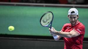 epa11121510 Joao Sousa of Portugal in action against Emil Ruusuvuori of Finland during their 2024 Davis Cup Finland vs Portugal qualifier tie singles match in Turku, Finland, 02 February 2024.  EPA/KIMMO BRANDT