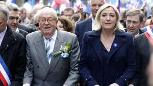 epa11811016 (FILE) - Former President of the Front National (FN) Jean-Marie Le Pen (L) and her daughter and actual President of the party Marine Le Pen (R) taking part in the party's traditional May Day rally in Paris, France, 01 May 2014 (re-issued 07 January 2025). Jean-Marie Le Pen has died on 07 January 2025 at the age of 96.  EPA/YOAN VALAT