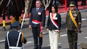 epa13140093 Peruvian President Keiko Fujimori (C) participates alongside Defense Minister Rafael Belaunde (L) in the traditional civic-military parade marking the 205th anniversary of Peru's independence in Lima, Peru, 29 July 2026. Fujimori took the oath of office on Peru's Independence Day, becoming the nation's first female president after defeating leftist opponent Roberto Sanchez in the June runoff election.  EPA/PAOLO AGUILAR