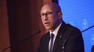 epa13136890 President of the French Soccer Federation Philippe Diallo (L) holds a press conference to introduce French former player Zinedine Zidane (unseen) as the new head coach of the French men's national soccer team at the federation's headquarters in Paris, France, 28 July 2026.  EPA/TERESA SUAREZ