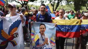 epa13260115 People demonstrate to demand the return of opposition leader and Nobel Peace Prize laureate Maria Corina Machado to Venezuela, in Caracas, Venezuela, 24 September 2026. A private flight intended to transport Venezuelan opposition leader Maria Corina Machado from Panama to Venezuela was grounded after landing clearances were denied by Bonaire, Aruba, and Curacao, according to sources familiar with the situation on 23 September 2026.  EPA/MIGUEL GUTIERREZ