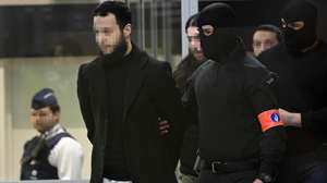 epa10556588 Defendants Salah Abdeslam, Osama Krayem and Mohamed Abrini are escorted by police as they arrive in court during the trial of the 2016 Brussels terror attacks at the Justitia building in Brussels, Belgium, 03 April 2023. Nine defendants are on trial over the March 22, 2016, bomb attacks at Brussels' Zaventem airport and Maelbeek metro station, that killed 32 people, and which were claimed by the Islamic State (IS) extremist group.  EPA/JOHN THYS / POOL  ATTENTION EDITORS: Faces pixelated at source  MAXPPP OUT