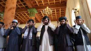 epa12997373 Afghan Muslims perform prayers on the first day of Eid al-Adha in Kabul, Afghanistan, 27 May 2026. Eid al-Adha, also known as the Feast of Sacrifice, coincides with the annual Hajj pilgrimage to Mecca and is traditionally marked by the sacrifice of livestock and the distribution of meat among family, friends and those in need.  EPA/STRINGER