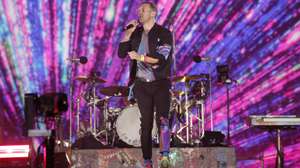 epa09859961 The vocalist of the British rock-pop band Coldplay Chris Martin performs, as part of his 'Music of the Spheres' world tour, at the Akron Stadium in Zapopan, Jalisco state, Mexico, 29 March 2022.  EPA/Francisco Guasco