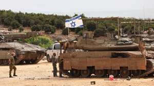 epa12819018 Israeli tanks are deployed along the Israel-Lebanon border, in northern Israel, 14 March 2026. Israel resumed operations in Lebanon in early March 2026, targeting Hezbollah's infrastructure and personnel, after the group launched attacks in retaliation for the assassination of Iranian Supreme Leader Ali Khamenei.  EPA/ATEF SAFADI