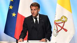 epa13268091 French President Emmanuel Macron speaks during the meeting titled 'At the Roots of Europe for Peace and Unity', at the Robert Schuman Conference Centre, Metz, France, 28 September 2026. The Pontiff arrived in Metz on the last day of his four-day visit to France.  EPA/MAURIZIO BRAMBATTI