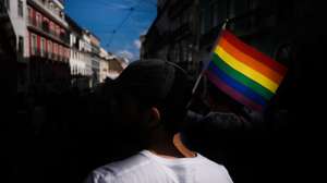 epa10021105 People take part in the 23rd Lisbon pride parade against the discrimination of lesbian, gay, bisexual, and transgender (LGBT) people, in Lisbon, Portugal, 18 June 2022.  EPA/MARIO CRUZ