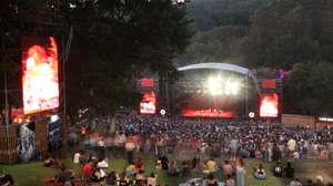 Attendees enjoy the opening day of the Paredes de Coura music festival in Paredes de Coura, northern Portugal, 13 August 2024. The festival runs through 16 August. ESTELA SILVA/LUSA