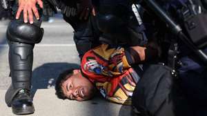 epa12169355 A protestor is arrested during protests sparked by immigration raids in Los Angeles, California, USA, 10 June 2025. Approximately 2,000 National Guard troops were deployed on 08 June in Los Angeles by US President Donald Trump, though the state of California had not requested any additional assistance, and protests have continued against the Trump administration's immigration enforcement raids over the last couple of days.  EPA/ALLISON DINNER