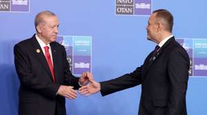 epa13097485 Turkish President Recep Tayyip Erdogan (L) welcomes Poland president Karol Nawrocki during the 2026 NATO Summit in Ankara, Turkey, 08 July 2026. The NATO Summit takes place from 07-08 July.  EPA/GEORGI LICOVSKI