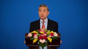 epa11781713 Chinese Foreign Minister Wang Yi gives a speech at the Symposium on the International Situation and China's Foreign Relations in Beijing, China, 17 December 2024.  EPA/JESSICA LEE