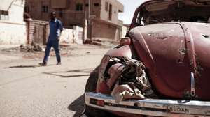 epa11700449 A burnt vehicle in Omdurman, Sudan, 01 November 2024 (issued 04 November 2024). On 02 November, Omdurman was under the control of the Sudanese Armed Forces. A civil war broke out April 2023 between the Sudanese military led by army chief Abdel Fattah al-Burhan, and the paramilitary Rapif Support Forces (RSF) led by Mohamed Hamdan Dagalo, the former Deputy Chairman of the Transitional Sovereignty Council of Sudan.The International Office for Migration (IOM) estimates that spme eight million people have been displaced internally or to neighbouring countries since April 2023.  EPA/SARA CRETA