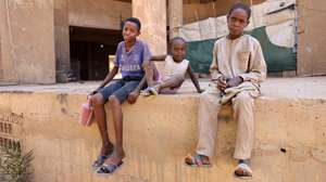 epa10578769 Sudanese children wait on a street while looking for drinking water after supplies were affected due to the ongoing fighting between Sudanese army and paramilitaries of the Rapid Support Forces (RSF) in Khartoum, Sudan, 18 April 2023. A power struggle erupted 15 April between the Sudanese army led by army Chief General Abdel Fattah al-Burhan and the paramilitaries of the Rapid Support Forces (RSF) led by General Mohamed Hamdan Dagalo, resulting in at least 200 deaths according to doctors' association in Sudan. The RSF on 18 April said it approved a 24-hour ceasefire to allow evacuation of the wounded, however the Sudanese army did not confirm the deal.  EPA/STRINGER