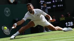 epa12222644 Novak Djokovic of Serbia in action during the Men's Singles Fourth Round match against Alex de Minaur of Australia at the Wimbledon Championships, Wimbledon, Britain, 07 July 2025.  EPA/NEIL HALL  EDITORIAL USE ONLY