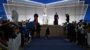 epa13184426 Pope Leo XIV (C-L) attends the annual Meeting for Friendship Among Peoples, organized by the Communion and Liberation movement, in Rimini, Italy, 22 August 2026.  EPA/ETTORE FERRARI